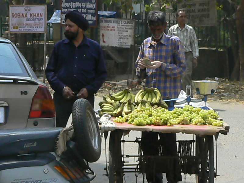 Vendeur de bananes et raisins
